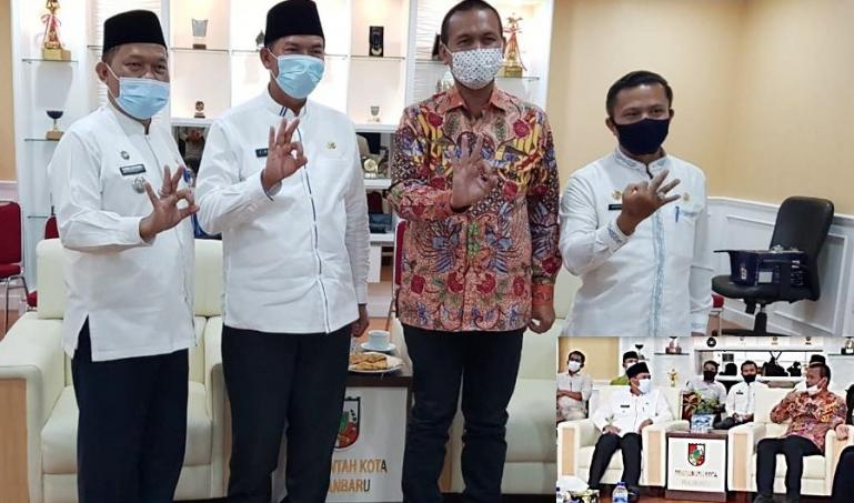 Wako Pariaman Genius Umar saat mengunjungi Wako Pekanbaru, Firdaus untuk penjajakan kerjasama investasi pengembangan sektor pariwisata, Jumat (15/1). (Dok : Istimewa)