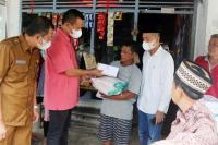 Pasca Hujan Lebat Melanda di Kota Pariaman: Dua Warga Dapat Bantuan dari Pemko Setempat