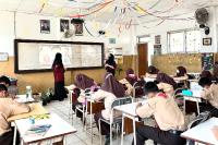 Dua SMP di Padang Jadi Sekolah Mitra BEM FKG Unand