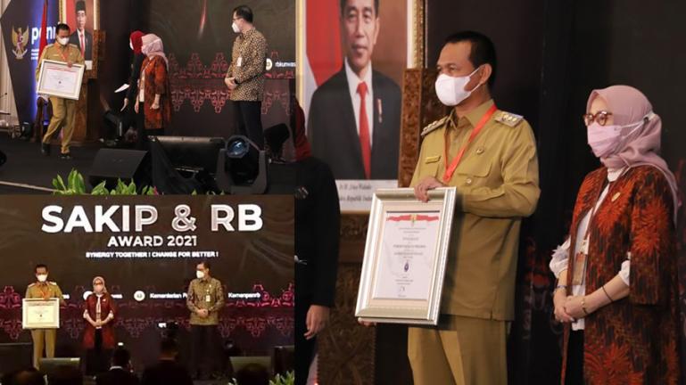 Wali Kota Pariaman, Genius Umar saat terima penghargaan SAKIP dan RB Award Tahun 2021 dari Kemenpan RB, Selasa (5/4). (Dok : Istimewa)