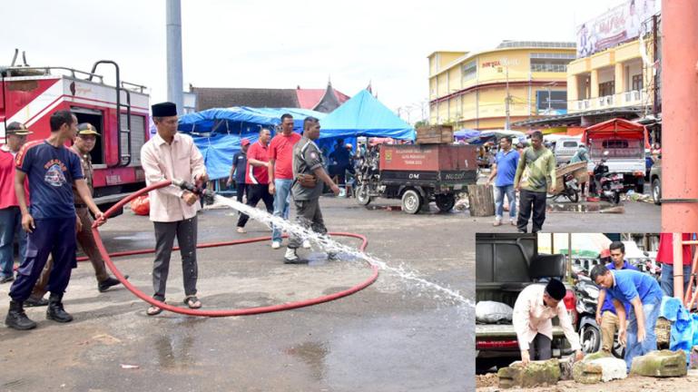 Wali Kota Genius Umar bersama sejumlah ASN dan non ASN bersihkan Lapangan Merdeka untuk pelaksanaan salat Ied itu, Minggu siang (1/5). (Dok : Istimewa)