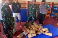 Sembunyikan 36 Kg Ganja di SD, 