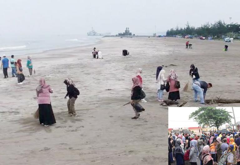 Para ASN di lingkup Pemko Pariaman terlihat bersihkan kawasan pantai yang jadi objek wisata di kota itu, Jumat pagi (20/10). (Dok : Istimewa)