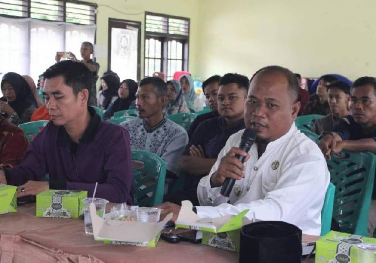 Terlihat perwakilan OPD Kabupaten Dharmasraya sampaikan tujuan kehadiran mereka di salah satu kecamatan di sana terkait verifikasi data piutang PBB yang masuk kategori kedaluarsa, Sabtu (3/2). (Dok : Istimewa)