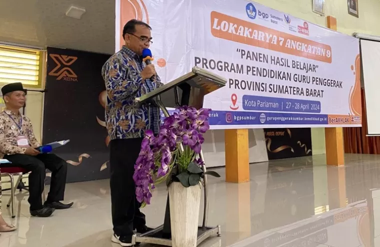 Kadis Dikpora Kota Pariaman, Kanderi membuka kegiatan program pendidikan guru penggerak angkatan di Aula SMK Negeri 2 Pariaman, Minggu (28/4/2024). (Dok : Istimewa)