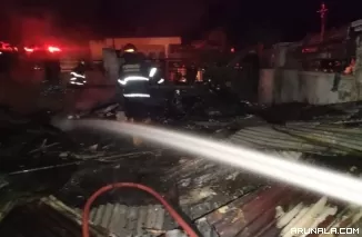 Senin Dinihari, Dua Bangunan di Padang Terbakar