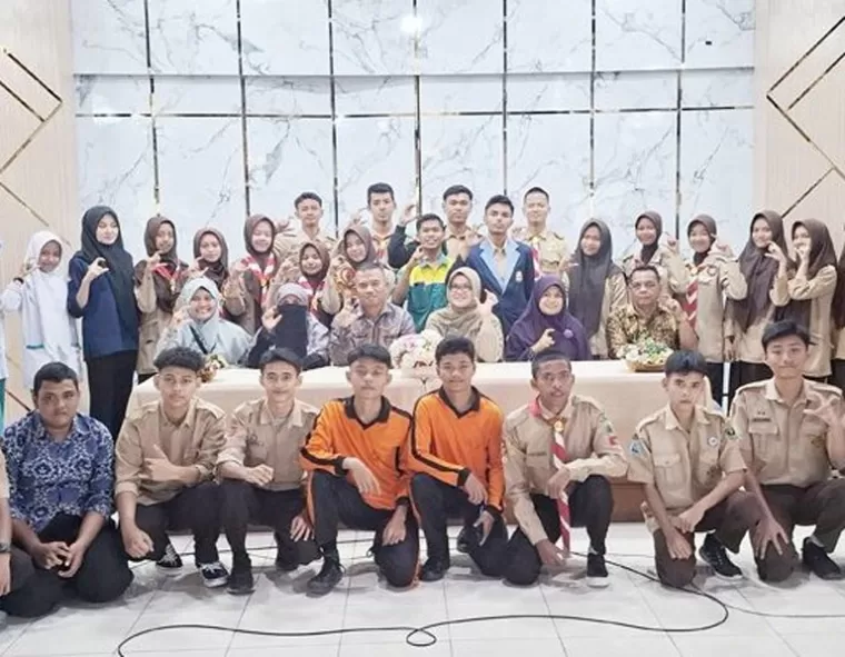Peserta sosialisasi foto bersama di sela-sela kegiatan yang diadakan Kamis (13/02/2025). IST