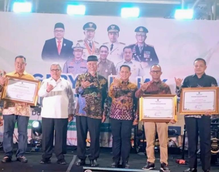 Ketua DPRD Sumbar Muhidi saat menghadiri peluncuran program Gebyar Pajak, di Padang Sabtu malam (3/10/2026). IST
